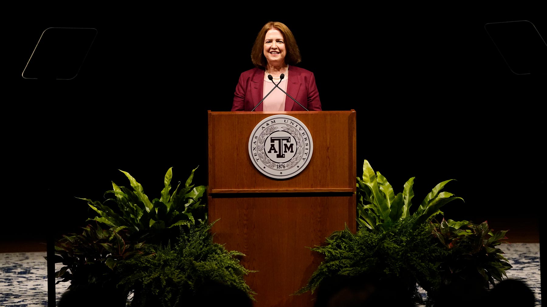 President M. Katherine Banks speaking at the podium